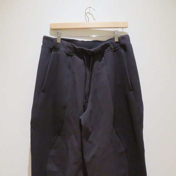 LULULEMON Mixed Fabric Relaxed-Fit Tapered High-Rise Pants in Black Barrel Large - Picture 5 of 14